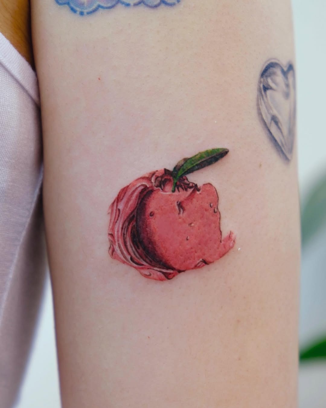 Vibrant Peach Tattoo with Unique Texture Tattoo Design
