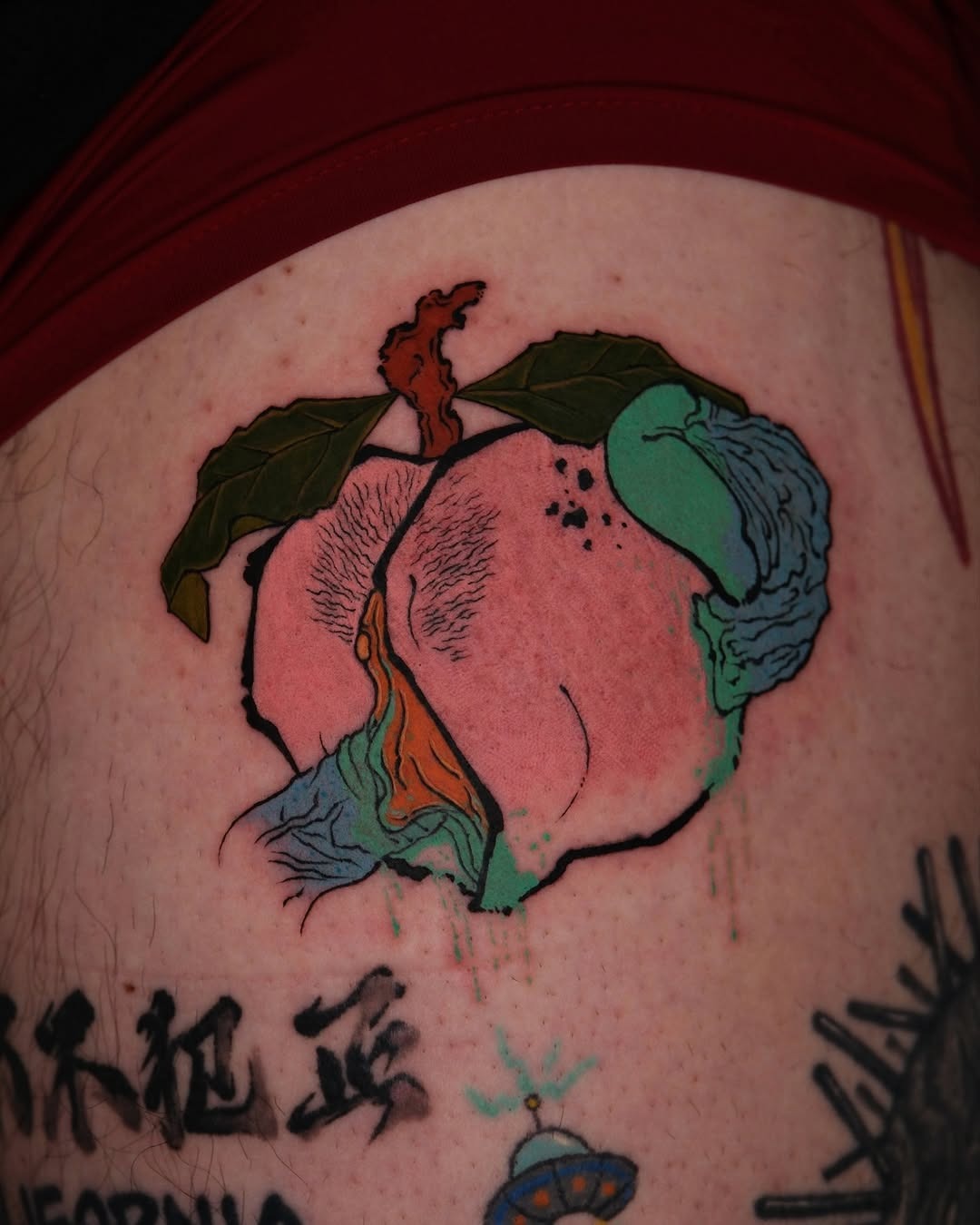 Vivid Peach Tattoo with Unique Design Elements Tattoo Design