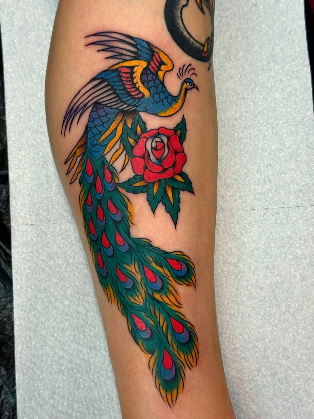 Stunning Peacock Tattoo with Floral Touch Tattoo Design