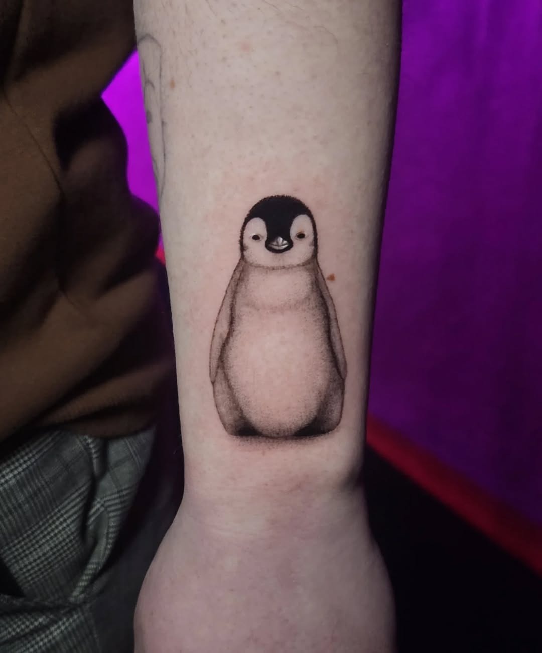 Charming penguin tattoo exuding playful vibes Tattoo Design