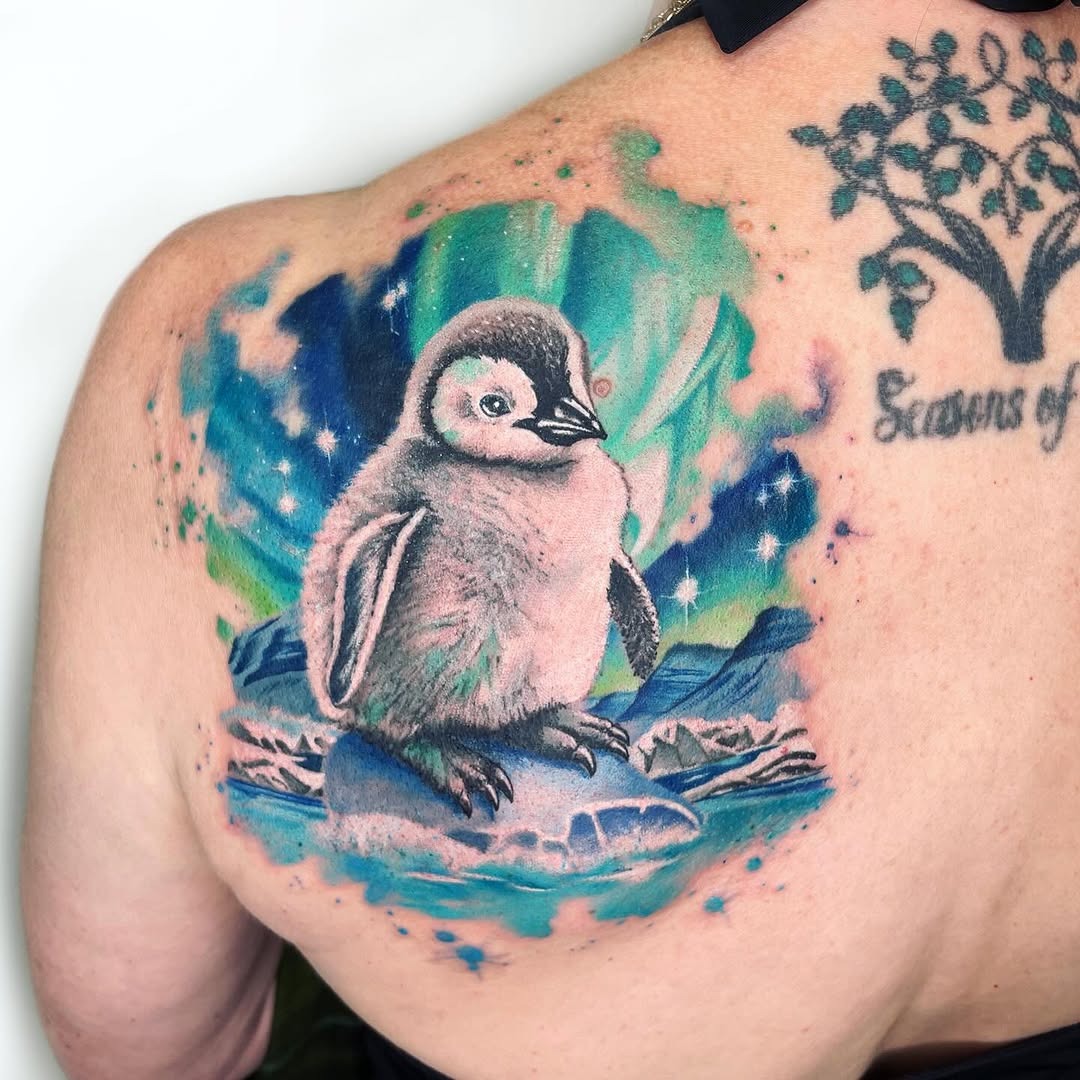 Charming Penguin Tattoo with Aurora Borealis Vibes Tattoo Design