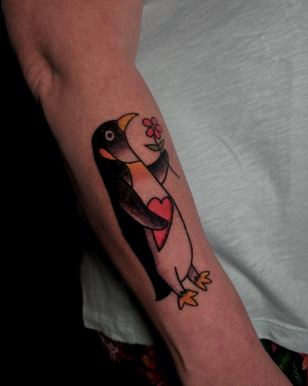 Charming Penguin Tattoo with Heart and Flower Tattoo Design