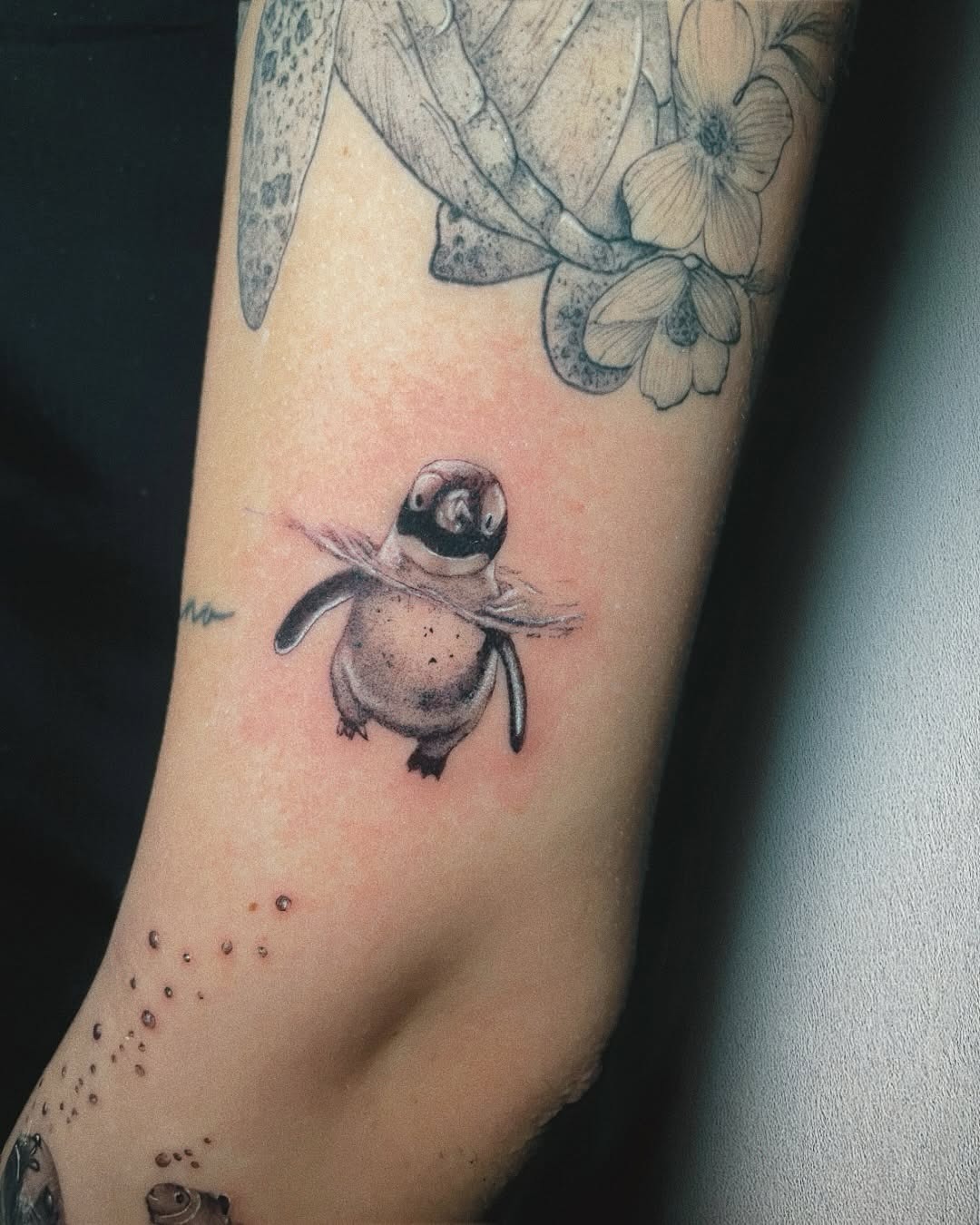 Charming Penguin Tattoo with Playful Vibes Tattoo Design