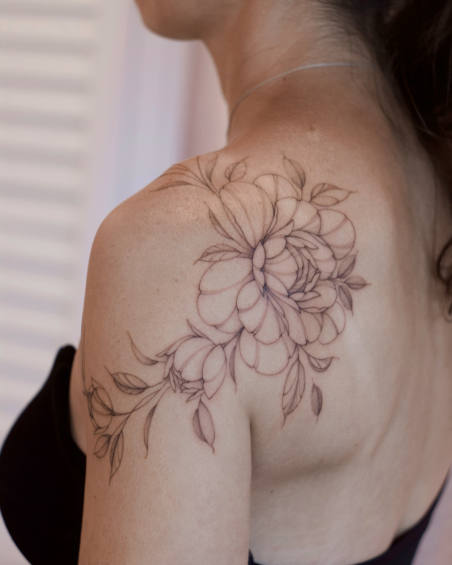 Minimalist Peony in a Bottle Tattoo Tattoo Design