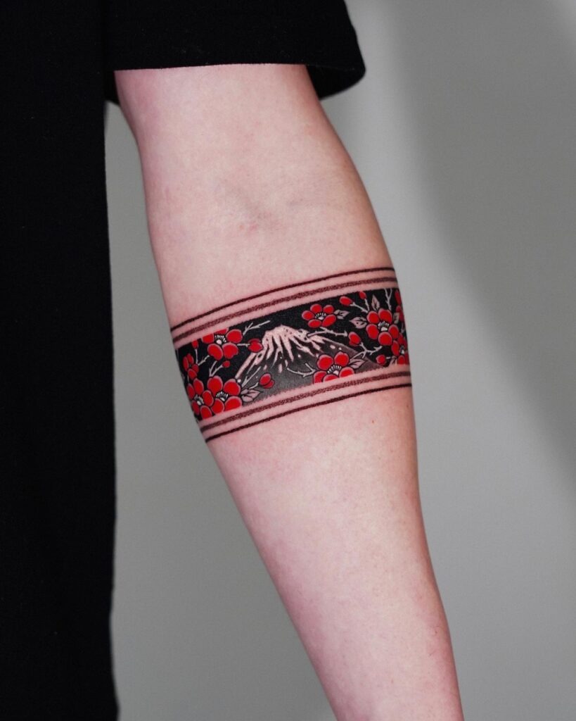 Peony Fan Tattoo with Red Accents and Tassel Tattoo Design