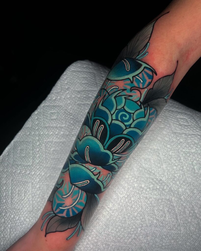 Vibrant Peony with Bold Black and Red Accents Tattoo Design