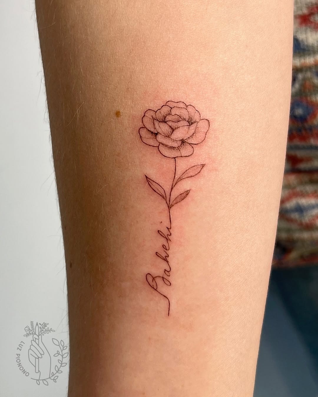 Delicate peony tattoo with whimsical lettering Tattoo Design