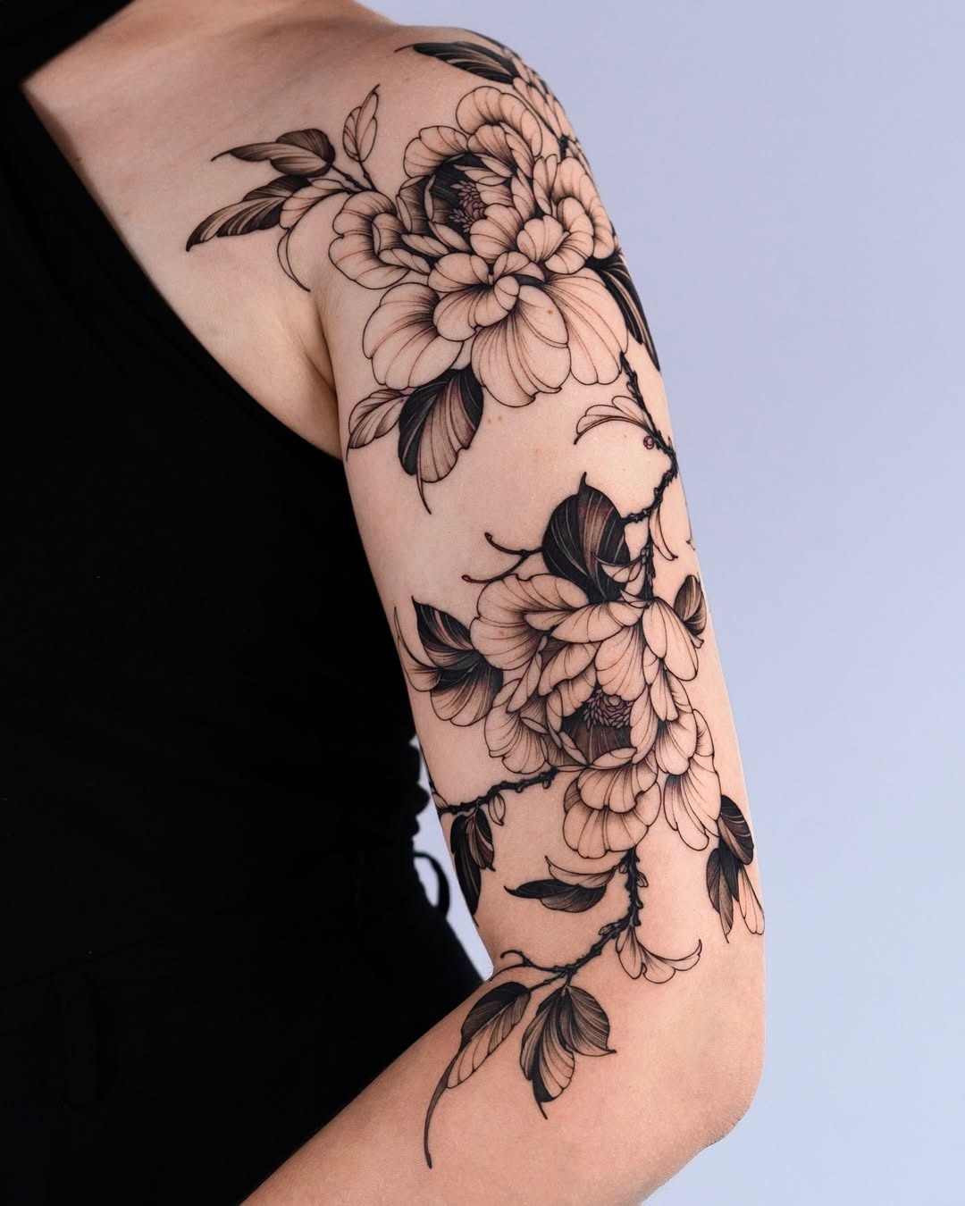 Elegant peony tattoo accentuating the arm Tattoo Design