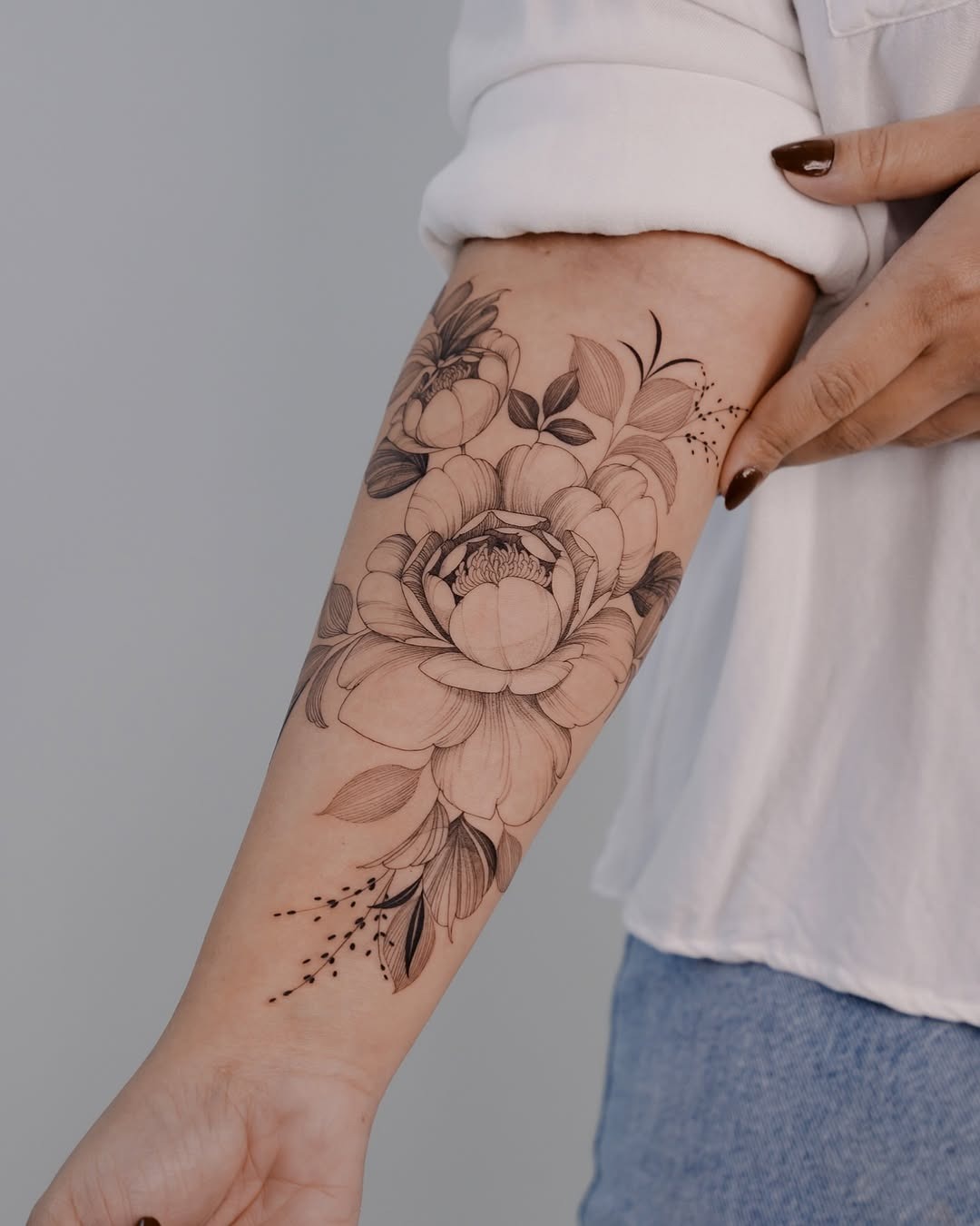 Stunning peony tattoo with intricate details Tattoo Design