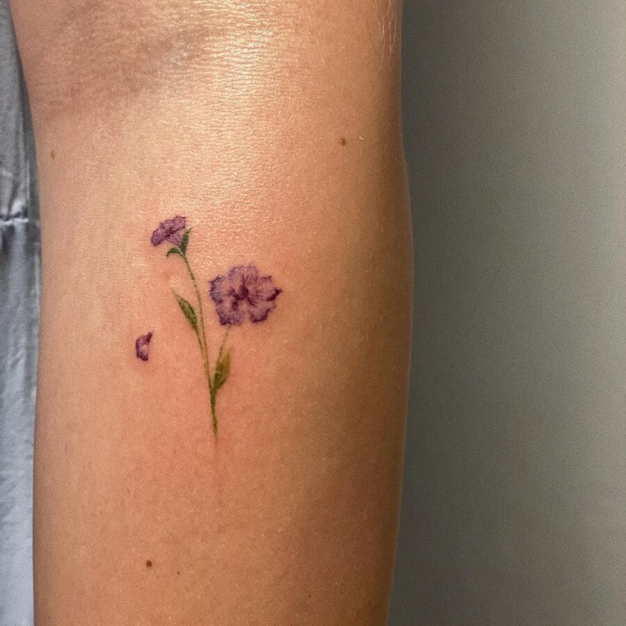 Delicate petunia tattoo on the arm Tattoo Design