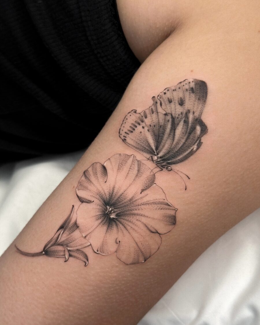 Elegant petunia and butterfly tattoo design Tattoo Design
