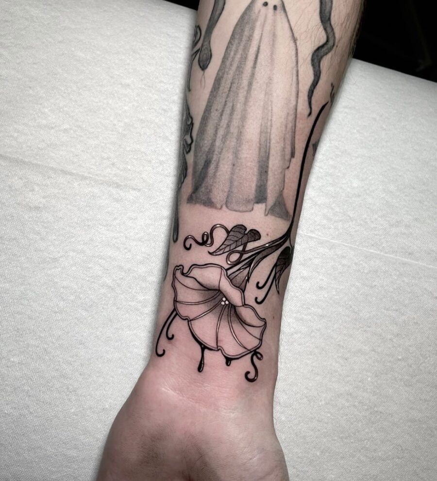 Elegant petunia tattoo with a minimalist touch Tattoo Design
