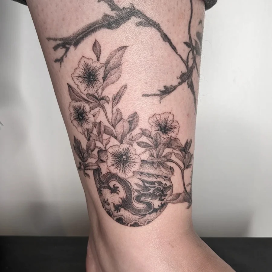 Intricate Petunia Tattoo on Ankle Tattoo Design