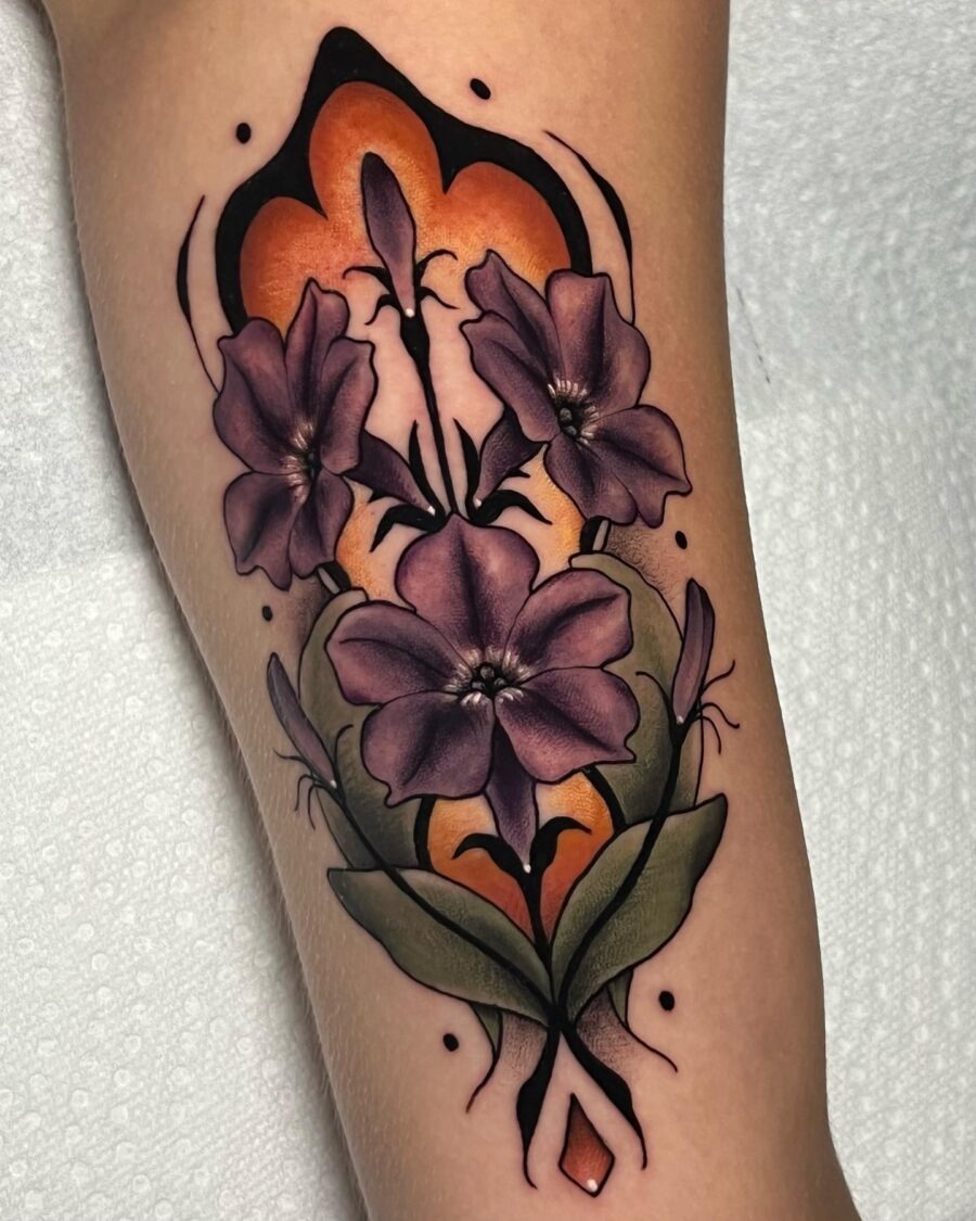 Stunning petunia tattoo design with bold colors Tattoo Design