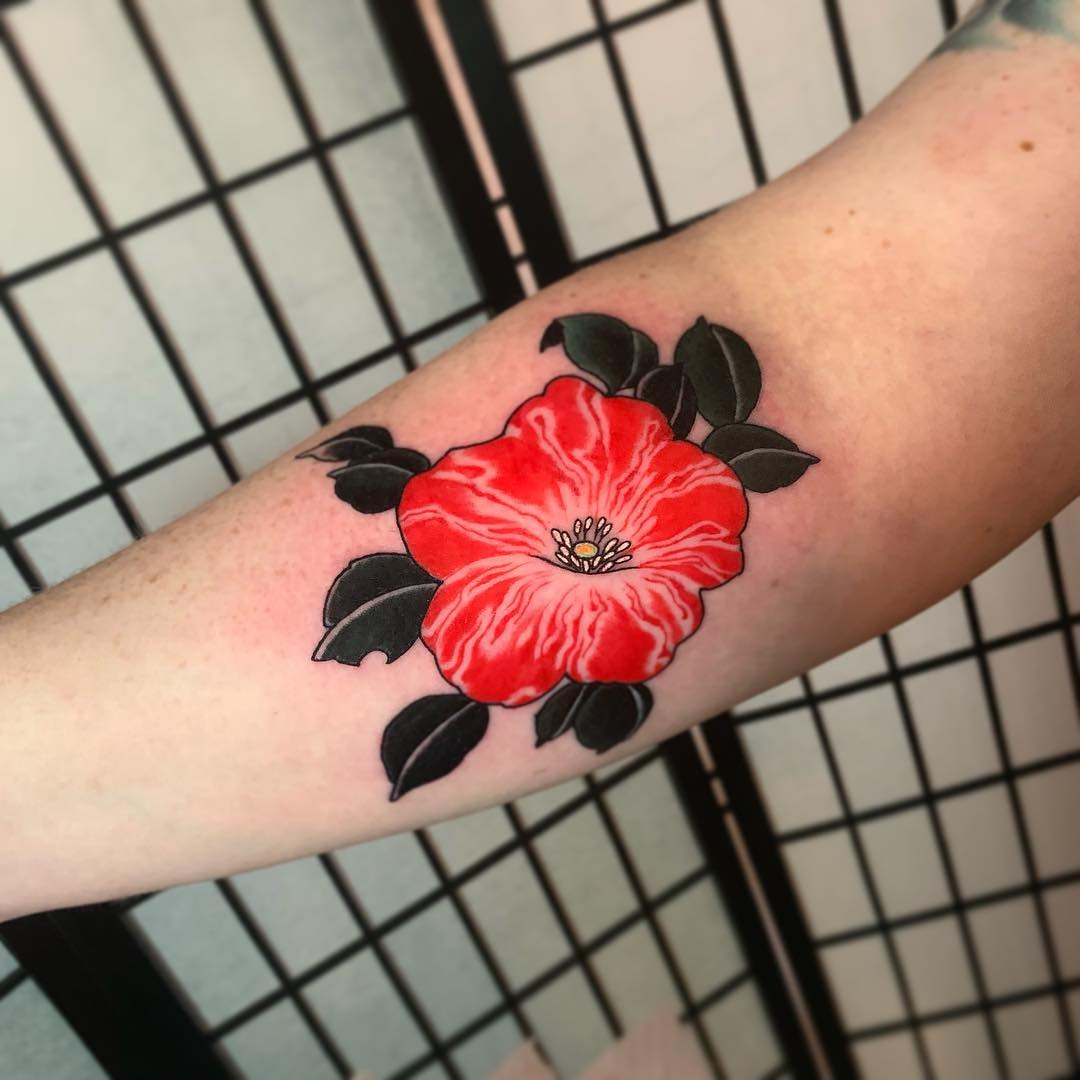 Vibrant red petunia tattoo with bold outlines Tattoo Design