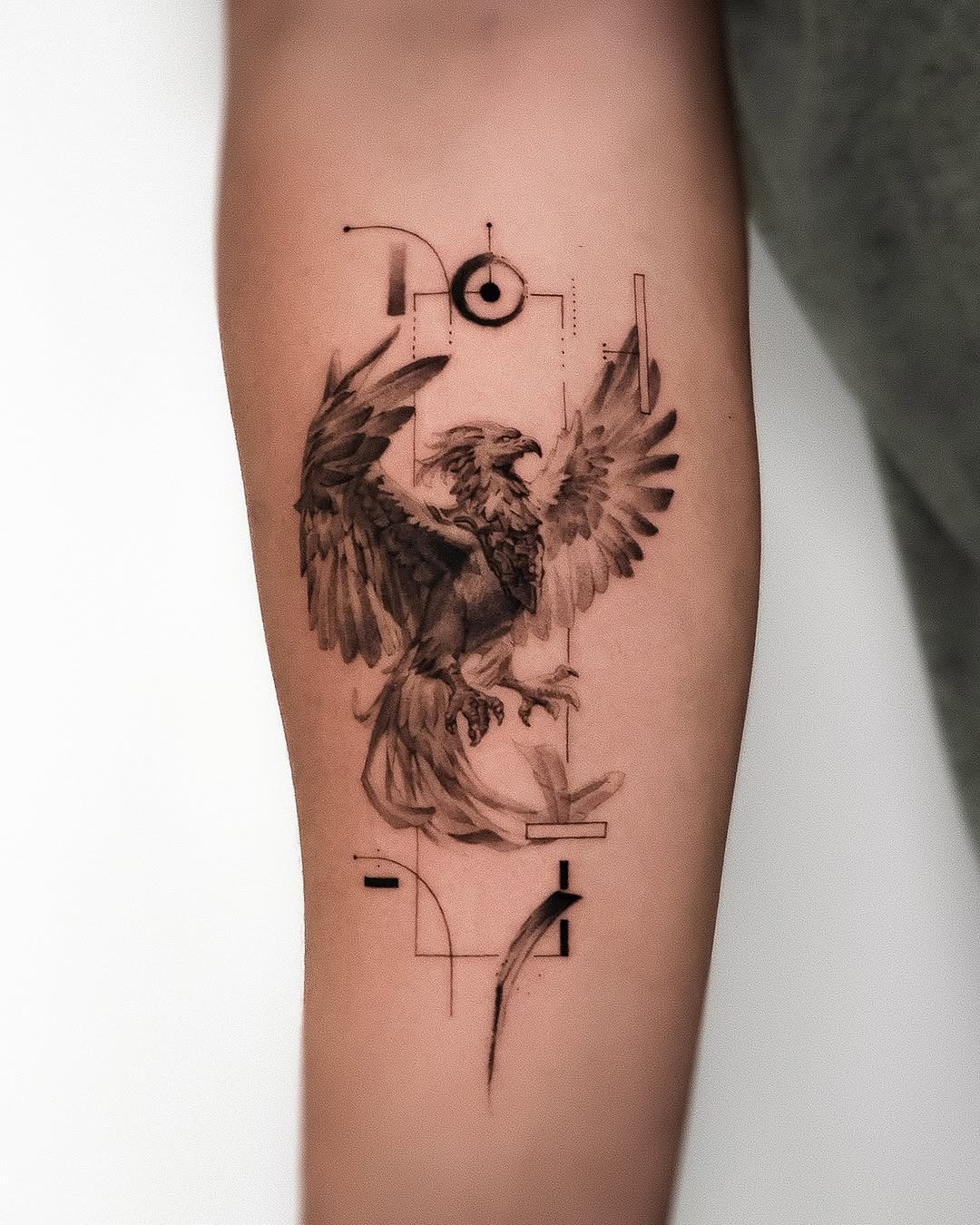 Artistic phoenix tattoo with intricate details Tattoo Design