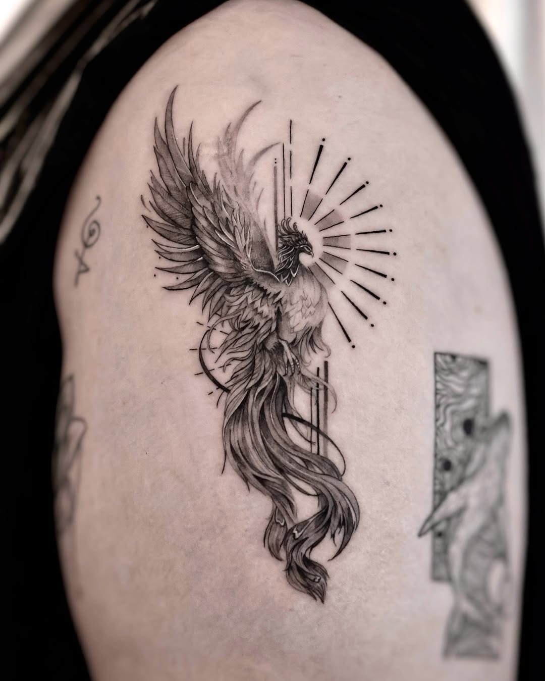 Stunning phoenix tattoo radiates power and rebirth Tattoo Design