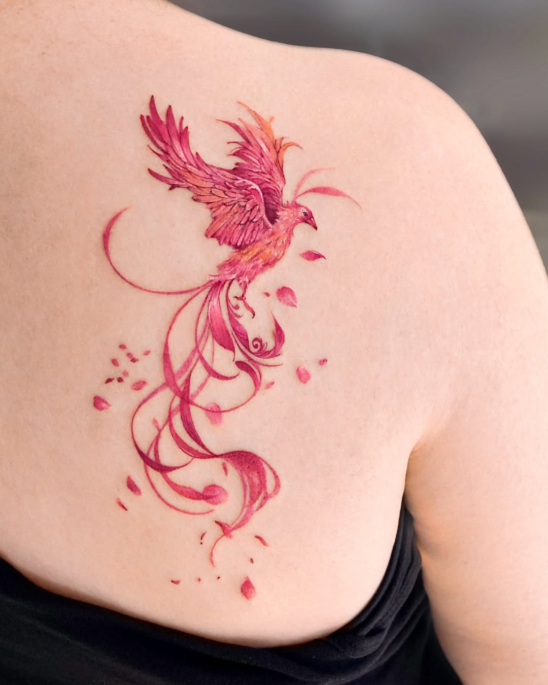 Stunning pink phoenix tattoo with flowing designs Tattoo Design