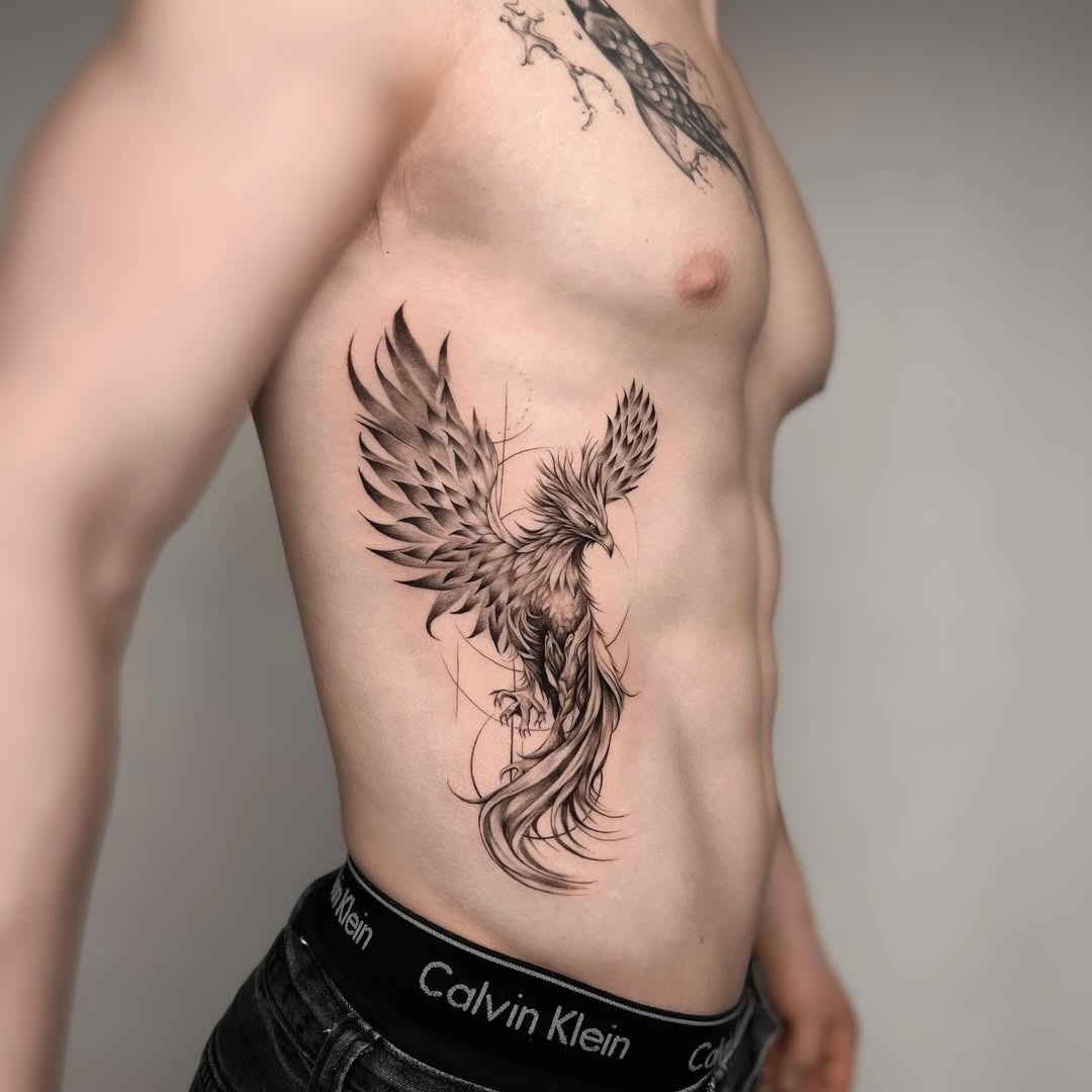 Vibrant phoenix tattoo showcasing rebirth symbolism Tattoo Design
