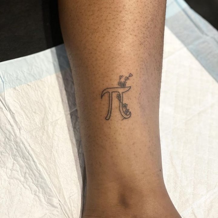 Whimsical pi symbol with floral accents Tattoo Design