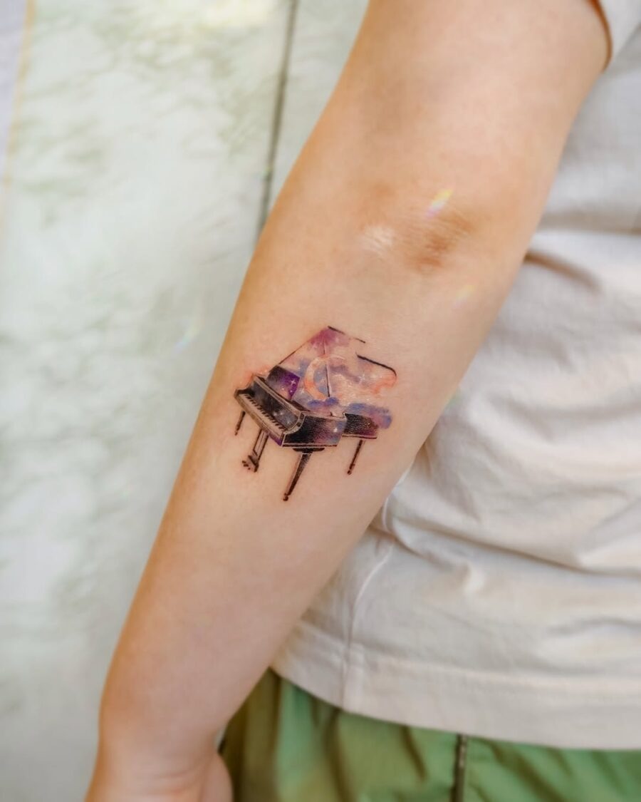 A vibrant grand piano tattoo exuding creativity Tattoo Design