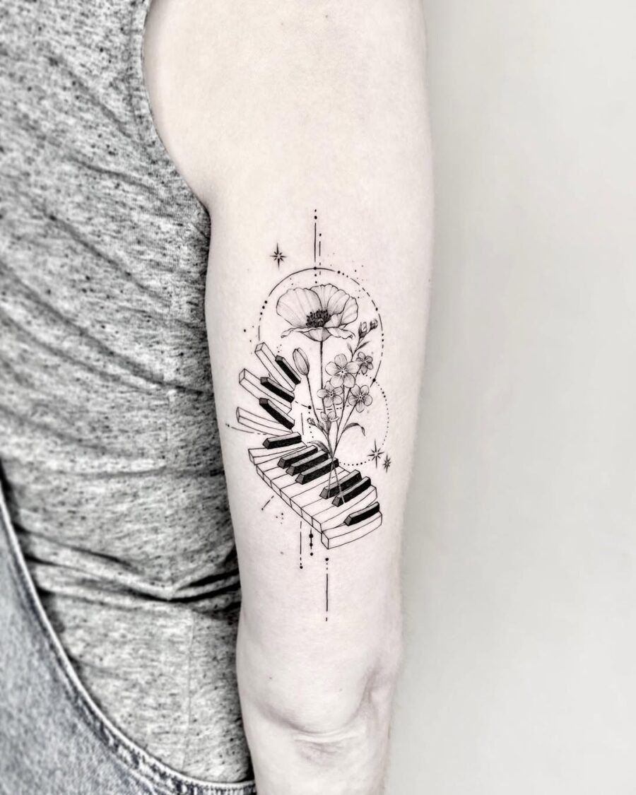 Elegant piano and floral tattoo design Tattoo Design