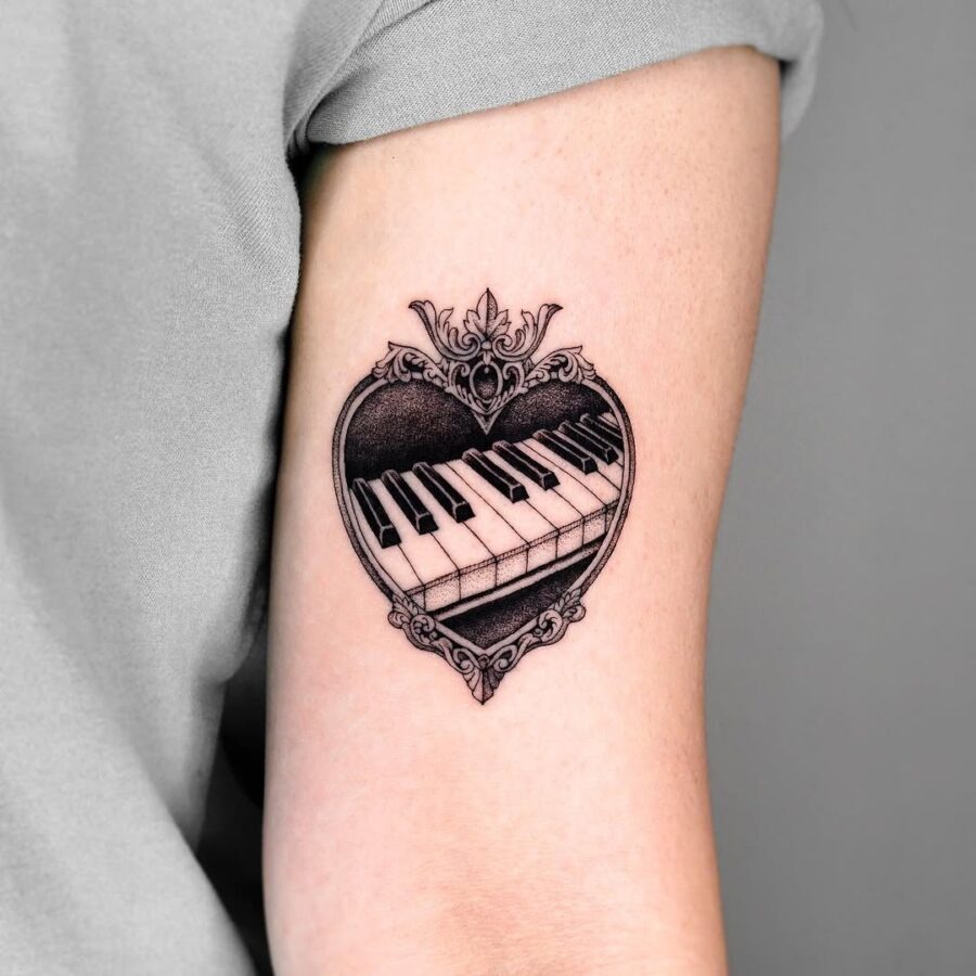 Elegant piano tattoo inside a heart design Tattoo Design