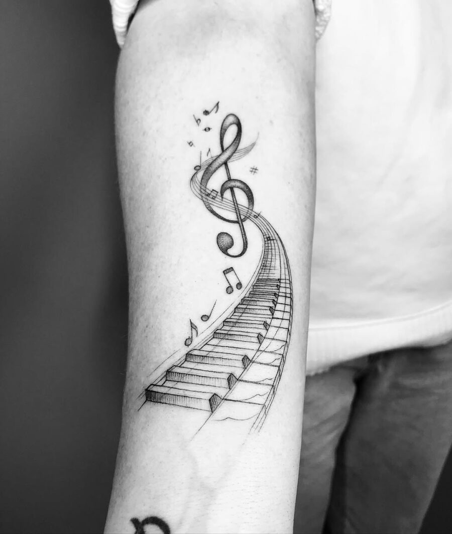 Elegant piano tattoo with musical flair Tattoo Design