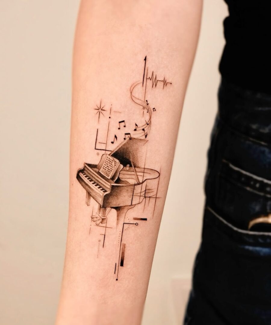 Elegantly crafted piano tattoo showcasing musical elements Tattoo Design