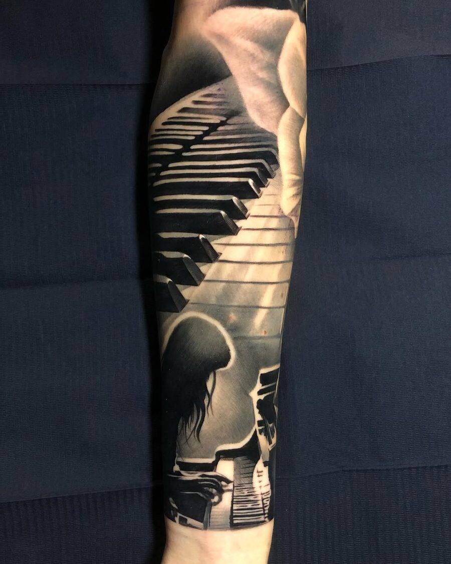 Intricate piano tattoo creating musical harmony Tattoo Design