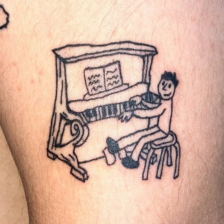 Joyful character playing piano tattoo design Tattoo Design