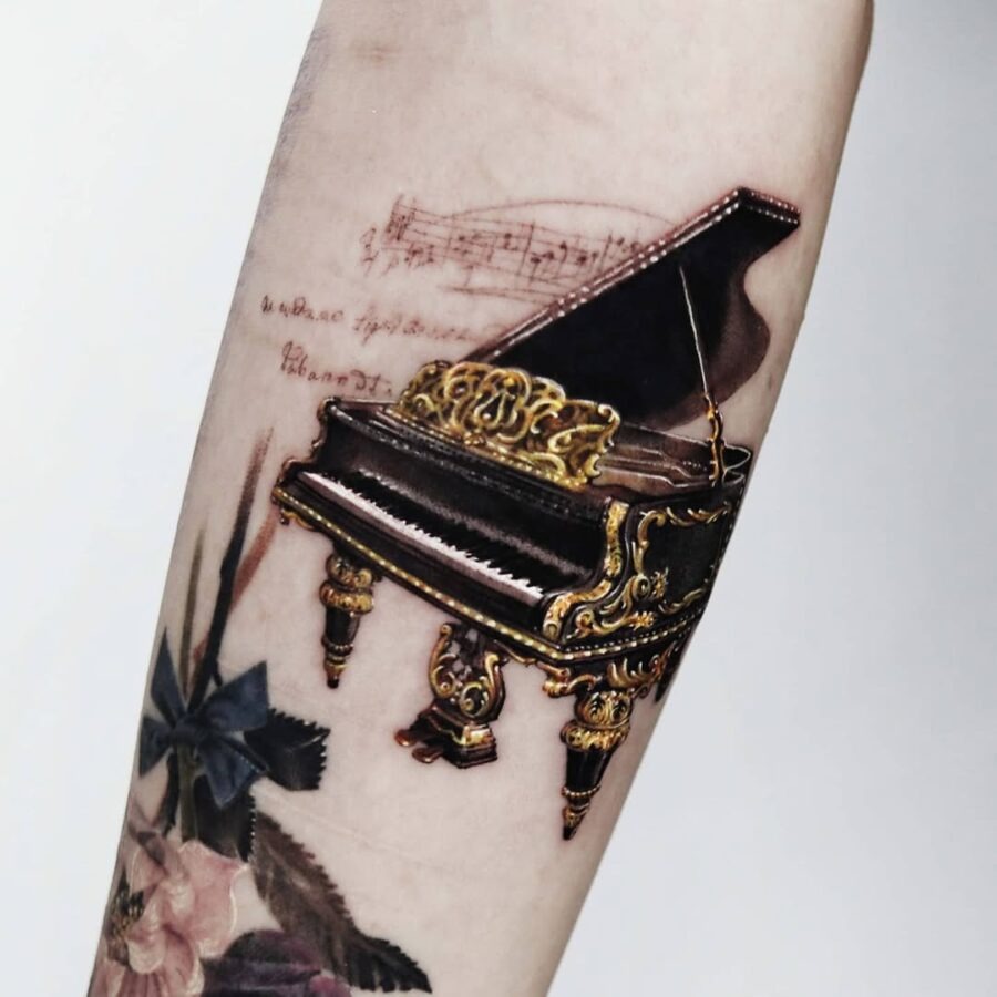 Stunning Detailed Piano Tattoo on Forearm Tattoo Design
