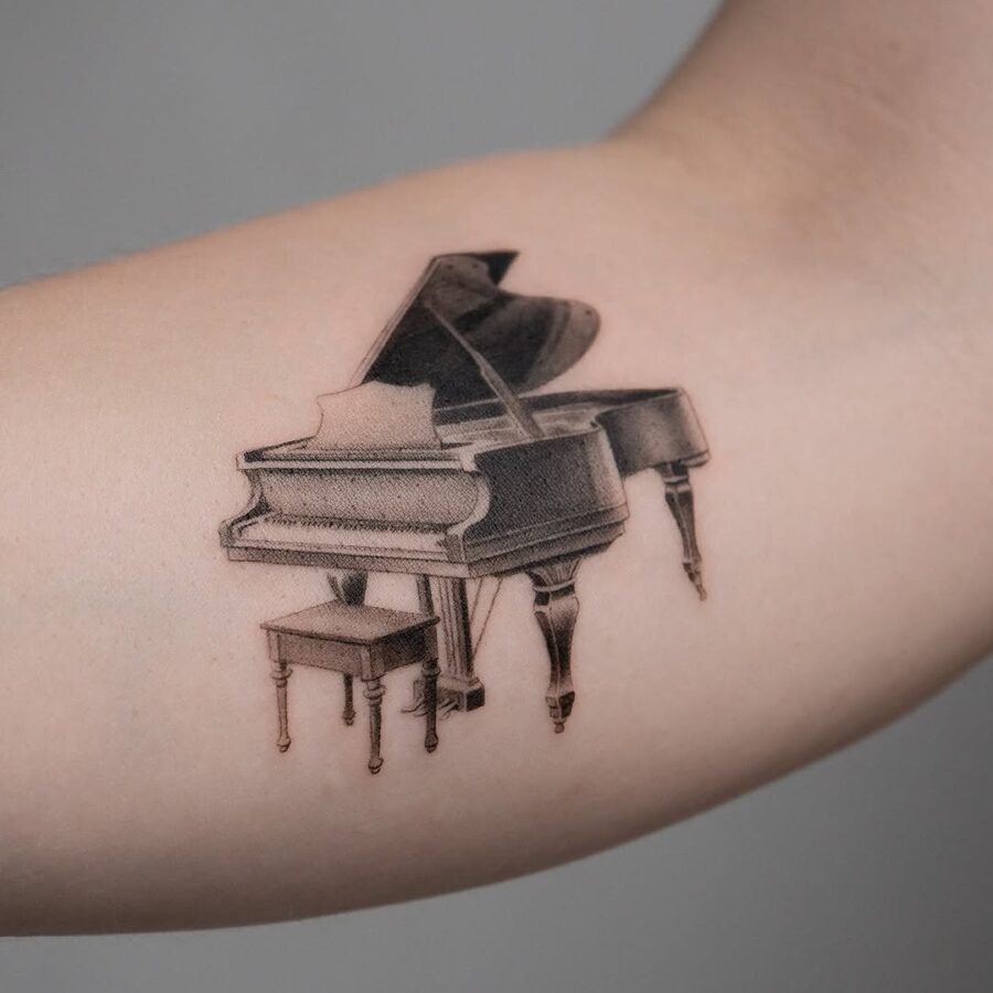 Stunning Grand Piano Tattoo Design on Arm Tattoo Design
