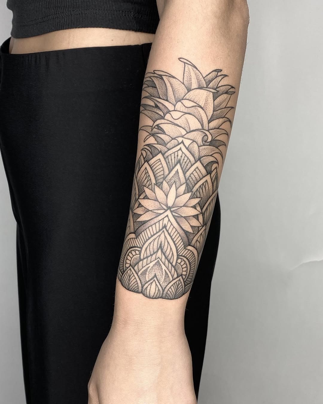 Bright pineapple tattoo with sunset hues Tattoo Design