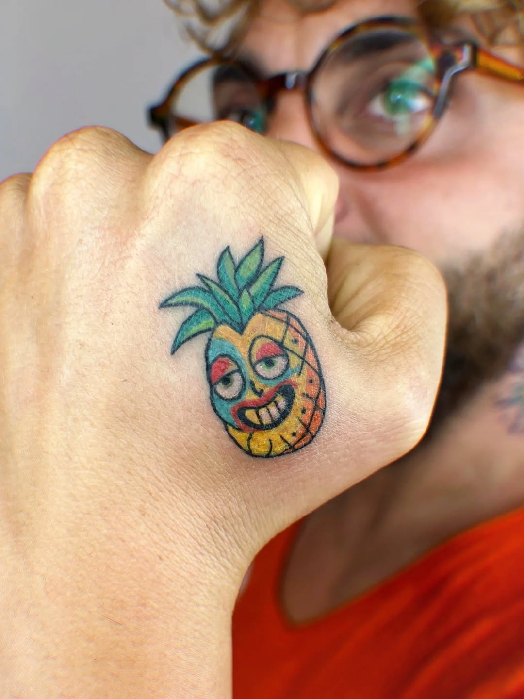 Playful pineapple tattoo with vibrant colors Tattoo Design