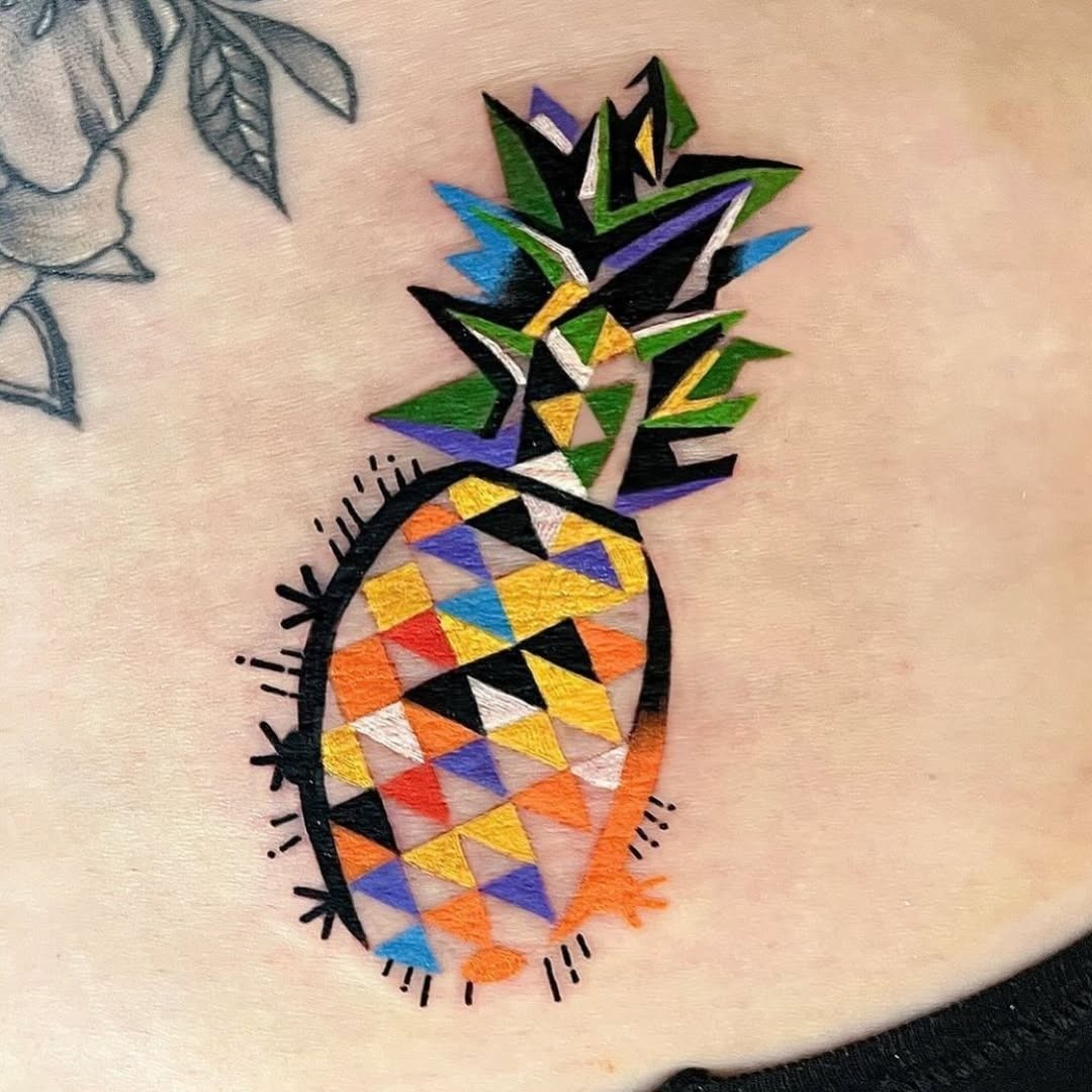 Vibrant geometric pineapple tattoo with bold colors Tattoo Design