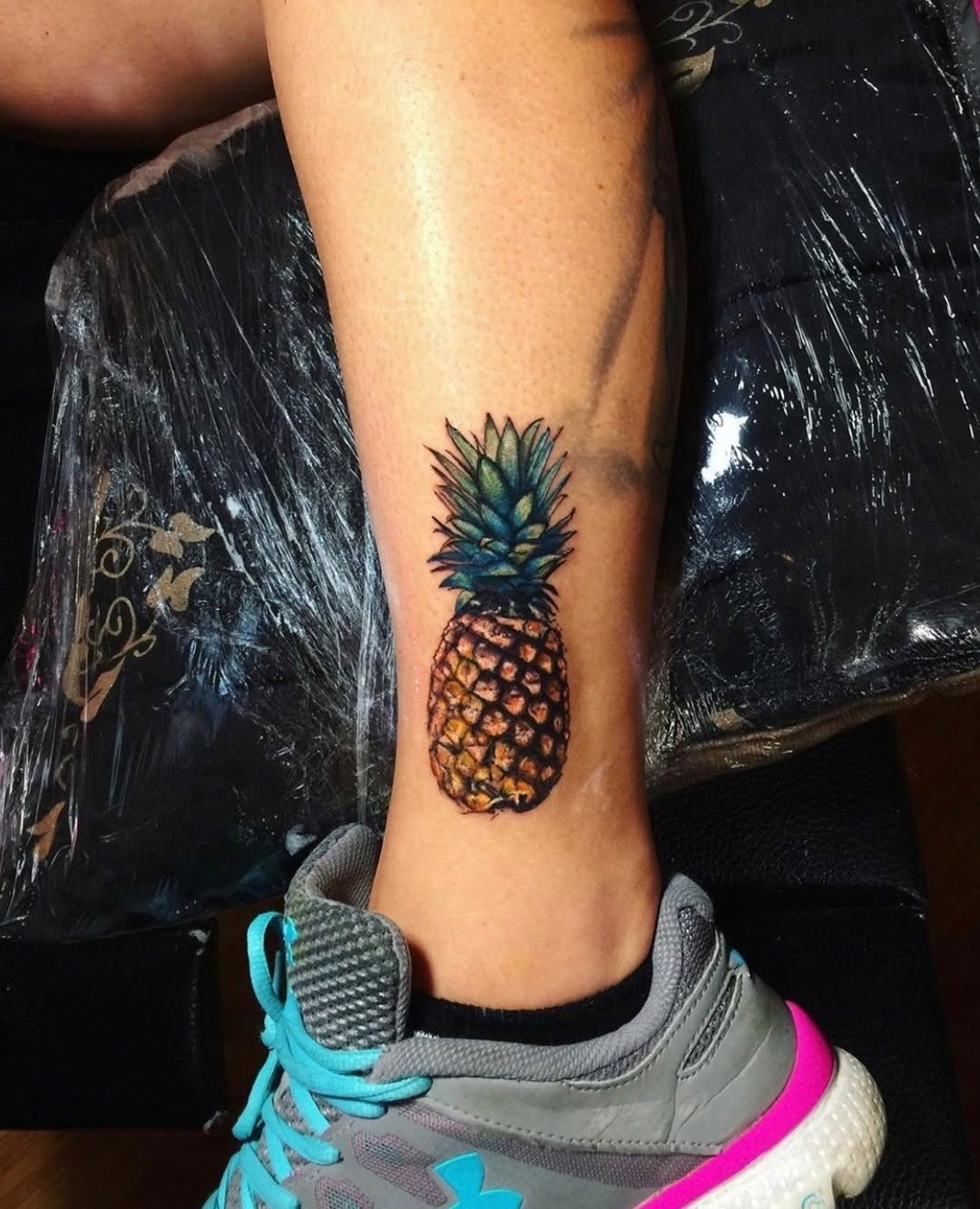 Vibrant pineapple tattoo with bold colors Tattoo Design