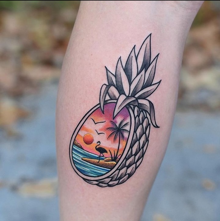 Vibrant tattoo with a tropical sunset scene Tattoo Design
