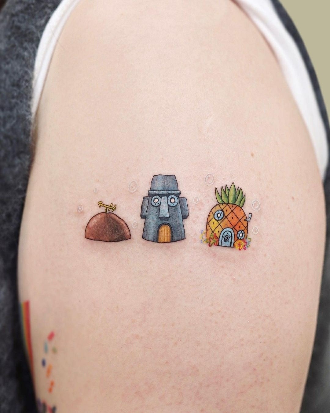 Whimsical pineapple tattoo with ocean elements Tattoo Design