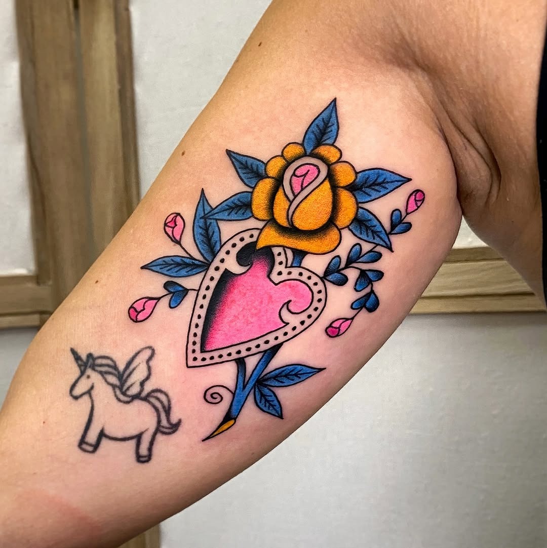 Charming pink heart and floral tattoo design Tattoo Design