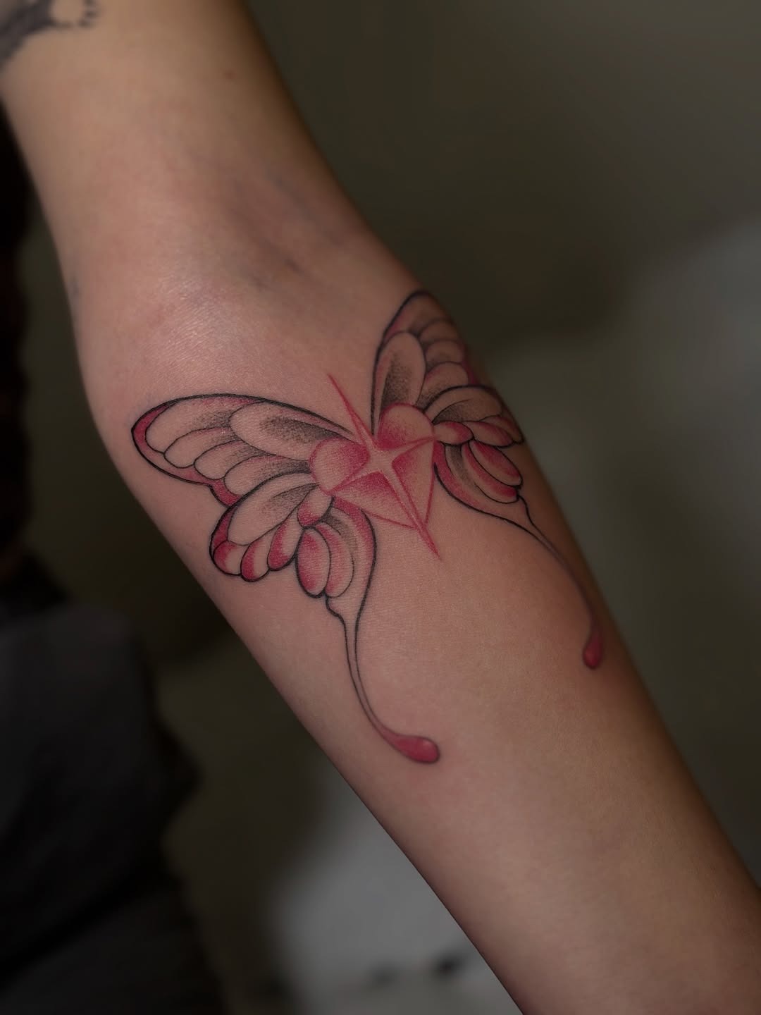 Elegant pink butterfly tattoo with delicate details Tattoo Design