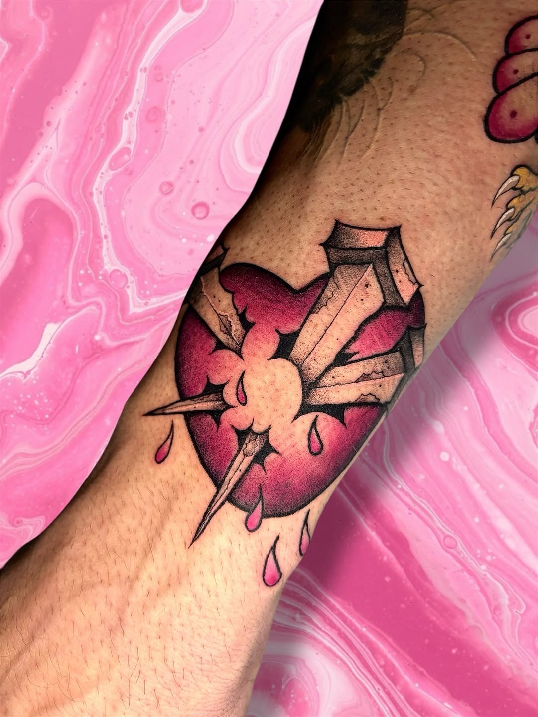 Striking Pink Heart Tattoo with Sword Tattoo Design