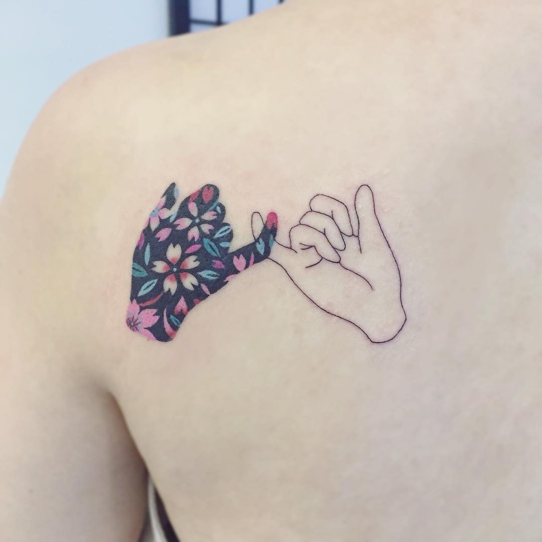 Colorful floral pinky promise tattoo design Tattoo Design