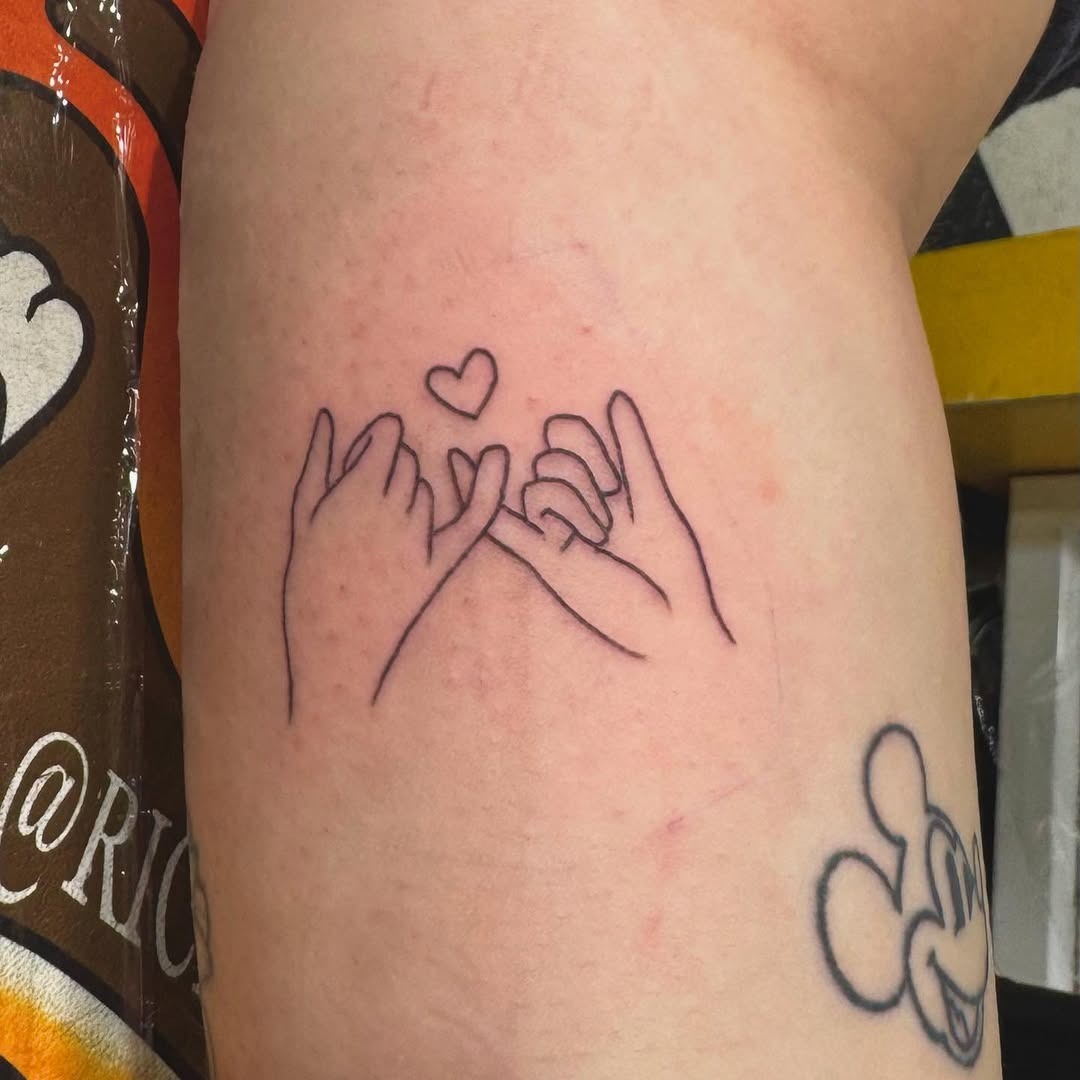 Delicate pinky promise tattoo with heart design Tattoo Design