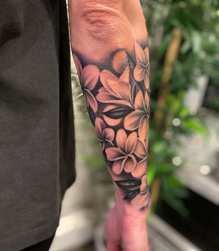 Flowing Shoulder Plumeria Sleeve Tattoo Design