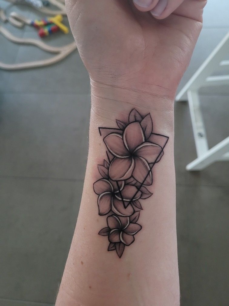 Geometric Plumeria Wrist Composition Tattoo Design