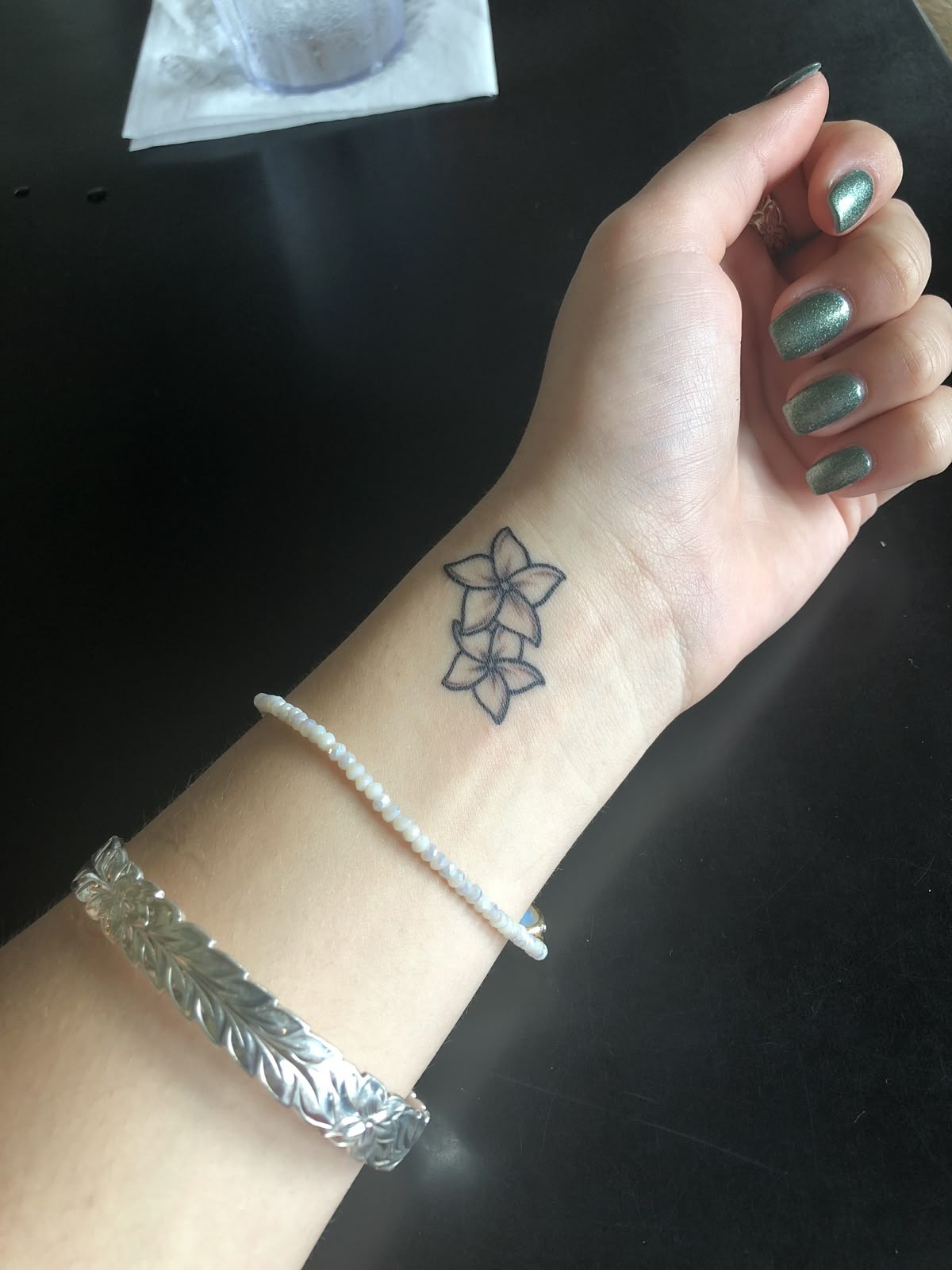 Pink Plumeria Wrist Pair Tattoo Design