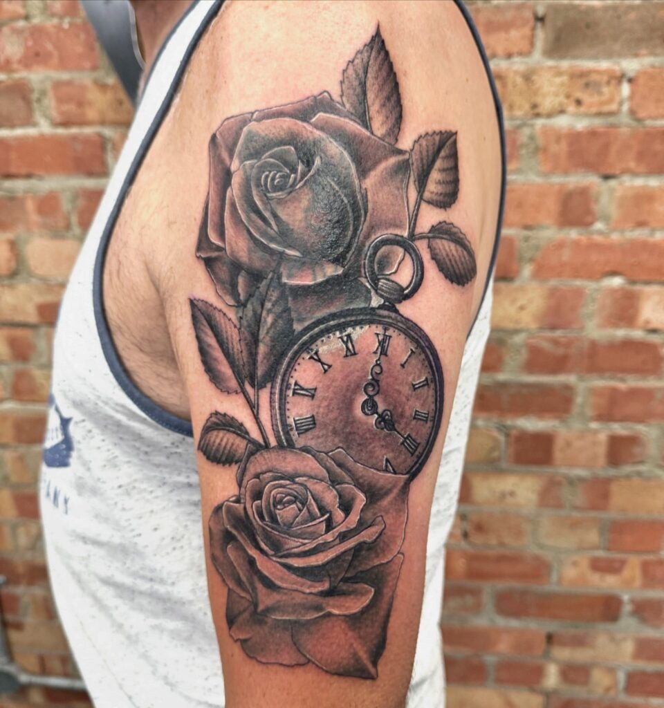 Shattered Pocket Watch Tattoo with Blooming Flowers Tattoo Design