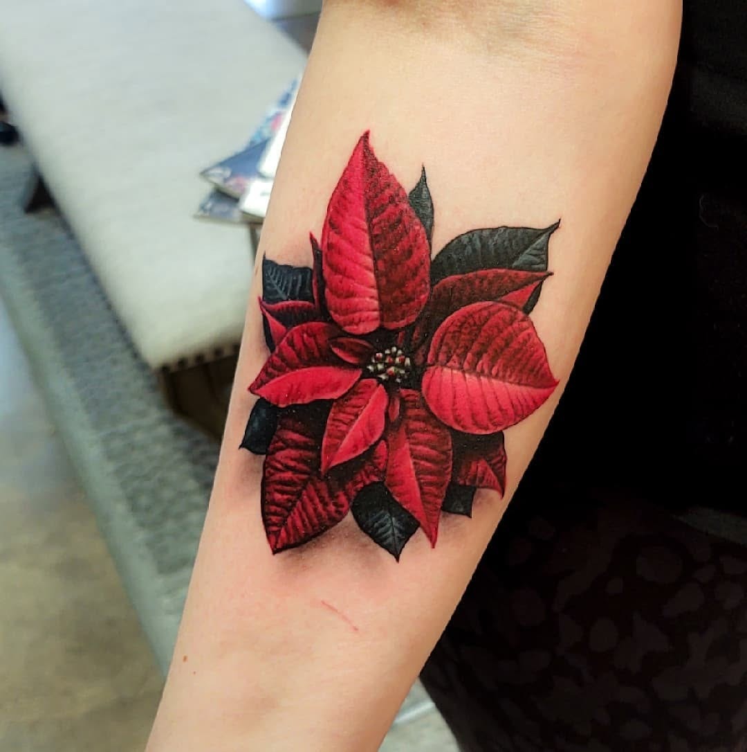 Beautiful and bold poinsettia tattoo design Tattoo Design