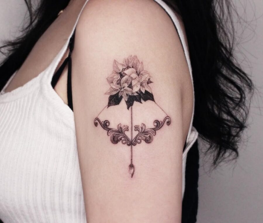 Elegant poinsettia tattoo with ornate details Tattoo Design